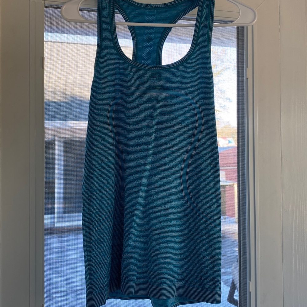 Lululemon workout tank. Beautiful teal color.  Smoke free home